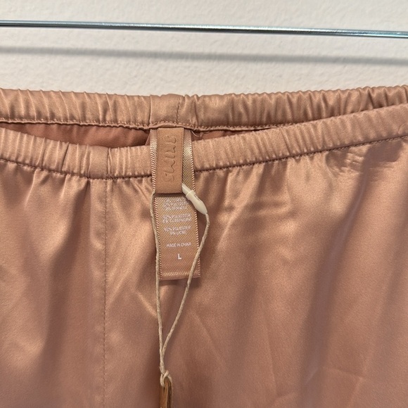 SKIMS Satin Pajama Pants in Blush - Picture 2 of 3